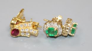 A pair of 14ct gold, emerald and diamond earrings and a pair of 18ct gold, ruby and diamond