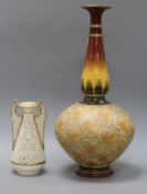 A Royal Doulton bottle vase and a Grainger vase tallest 44cm