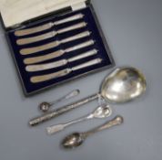 Small silver including six caed tea knives, three various spoons and a plated spoon.