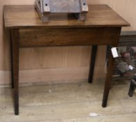 An oak side table W.84cm