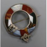 An early 20th century white metal and Scottish hardstone brooch, 52mm.