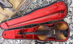 A 'Rosetti' violin bearing faux Stradivarius label, cased with bow