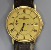 A gentleman's 18ct gold Baume & Mercier Baumatic wrist watch.