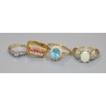 Four assorted dress rings including 18ct gold and diamond.