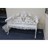 A pair of Victorian cast iron Coalbrookdale style benches w.150cm