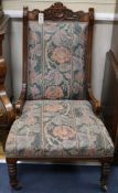 A pair of late Victorian walnut grandfather / nursing chairs