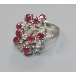 A white metal, pink and white gem set cocktail ring, size L/M