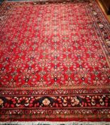 A Persian red ground carpet 400 x 334cm