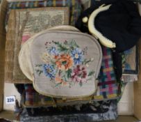 A collection of needleworked bags and purses