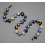 An early 20th century Venetian? cane glass bead necklace, with yellow metal spacers and clasp