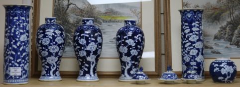 A pair of 19th century Chinese blue and white sleeve vases, three further vases and a ginger jar (