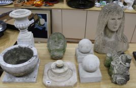 A stone head, another, pair of finials, mortar, etc tallest piece 47cm