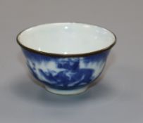 A small Chinese blue white inscribed teabowl, 19th century,