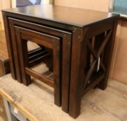 A nest of three hardwood tea tables w.60cm