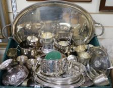 A collection of plated items, including a large oval two-handled tray, two siphon holders, various