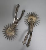 A pair of 19th century Spanish 24-rowel plated spurs