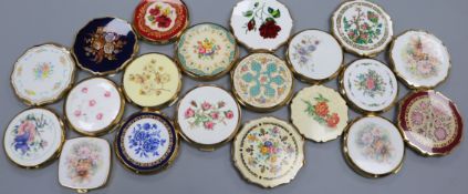 A collection of vintage Stratton powder compacts, including one Indian Tree design, ten with