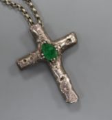 A 1970's white metal and emerald set cross pendant, on a silver belcher link chain, pendant 65mm.