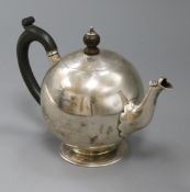 A Victorian silver bullet shaped teapot, Pairpoint Brothers, London, 1894, gross 11 oz.