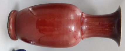 A large Chinese sang de boeuf vase of ovoid form, repair to rim, H 61cm