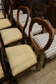 A pair of Victorian dining chairs with tapered legs