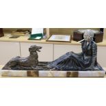 A spelter Art Deco style figure of a lady and a dog on marble base, signed Limosin L.65cm