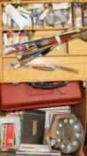 A quantity of artists' equipment, including an easel, paintbrushes, etc.