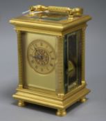 A French gilt brass repeating carriage clock, striking on gong, the movement stamped 'Aiguilles',