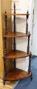 A Victorian walnut corner whatnot w.60cm