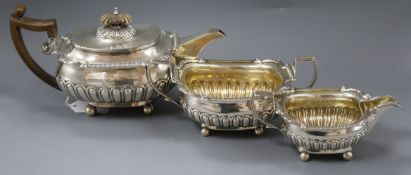 A George III silver three piece tea set, Robert Hennell I & Samuel Hennell, London, 1809, gross 39.5