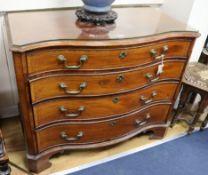 A George III satinwood banded mahogany serpentine dressing chest W.104cm