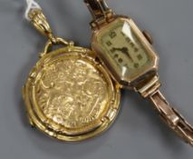 A 9ct gold locket and a 9ct gold ladys' wristwatch on expanding bracelet