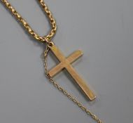 A 9ct. gold cross pendant on 9ct. chain.