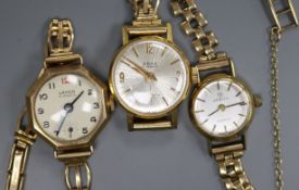 Two 9ct. gold lady's wrist watches and one other lady's wrist watch.