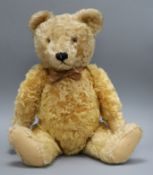 A 1950's Steiff teddy bear, Ralph, with golden mohair, brown and black glass eyes, pronounced