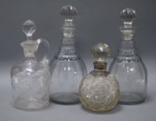 A pair of early 19th century decanters, an engraved carafe and a silver mounted jar