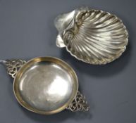 An early 20th century silver quaich and a silver butter shell, 4 oz.