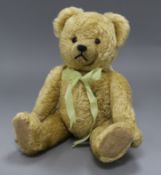 A 1950'S German Martin teddy bear, with golden mohair, deep amber and black glass eyes, pronounced