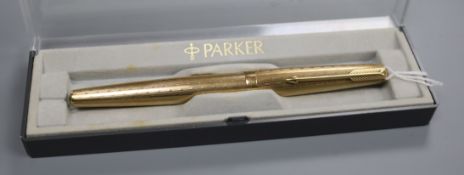 A Parker 61 9ct gold-cased fountain pen, with engine-turned decoration