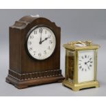 A brass carriage timepiece and a Waltham mahogany timepiece