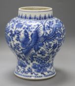 An 18ct century Chinese blue and white baluster vase decorated with birds height 23cm