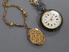 A silver fob watch and a 9ct. gold back and front locket on a yellow metal chain.