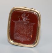 A Victorian yellow metal overlaid and carnelian fob seal with crested matrix, 30mm.