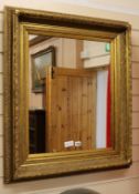 A rectangular gilt framed wall mirror W.75cm