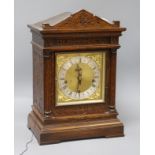 A late Victorian oak repeating bracket clock H.42cm