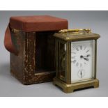 An early 20th century cased brass carriage timepiece with alarm