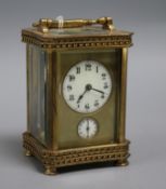 An early 20th century brass carriage timepiece with alarm