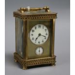 An early 20th century brass carriage timepiece with alarm