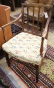 A Regency elm elbow chair