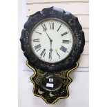 A Victorian papier mache wall clock W.47cm